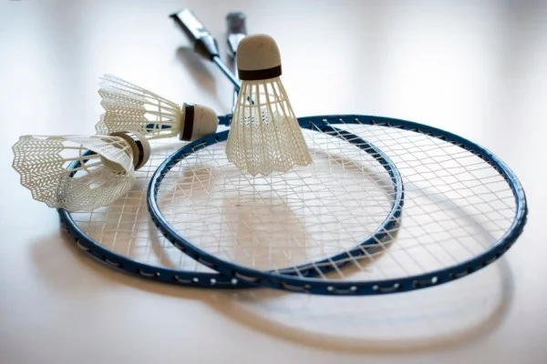 badminton racket and shuttlecock close-up